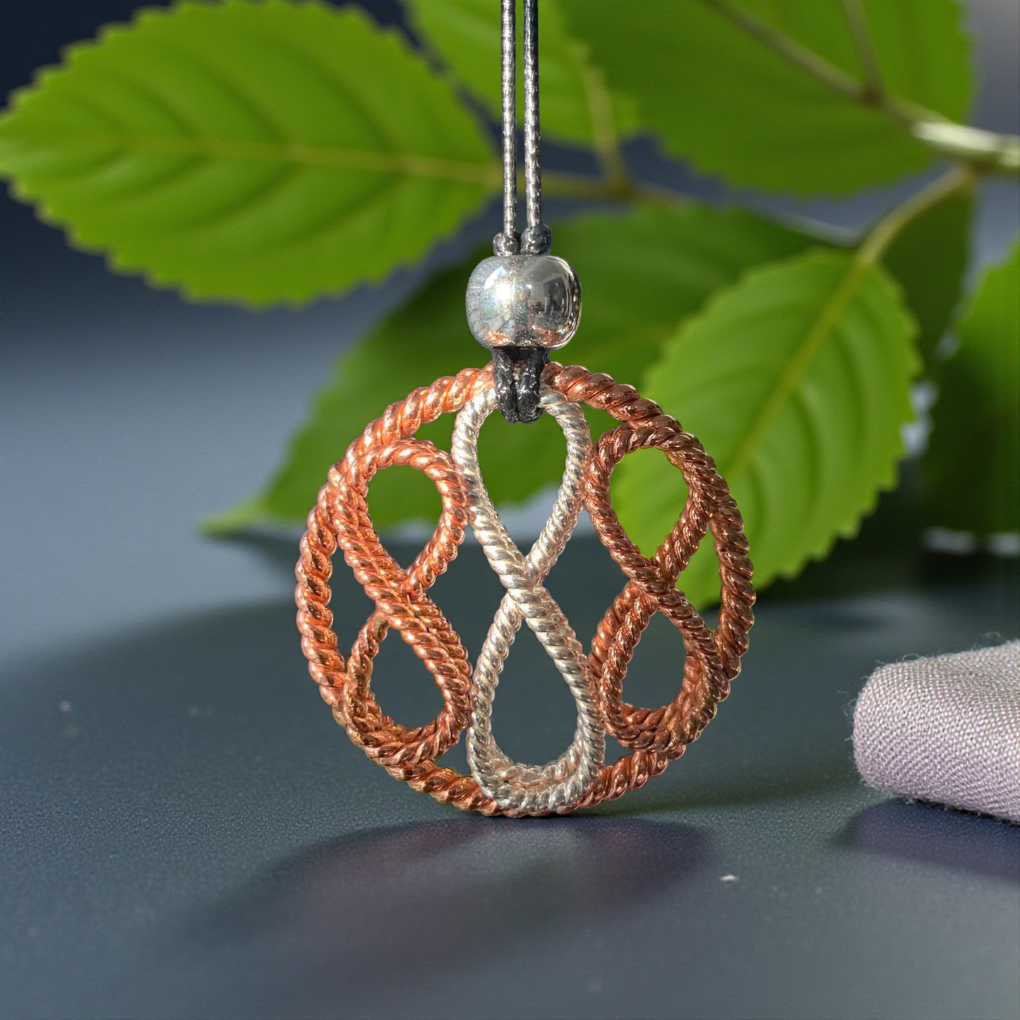 Celestial Infinity Pendant -Handcrafted Copper–Silver Energy Talisman